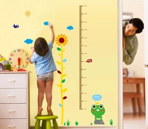 Macro detail of cartoon height chart with scale for kids room wall measurement