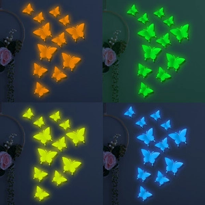 Detail view of 12pcs 3D glow in the dark butterfly wall stickers in four luminous colors