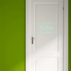Glow-in-the-dark toilet door sticker featuring green Toilet lettering and scroll patterns