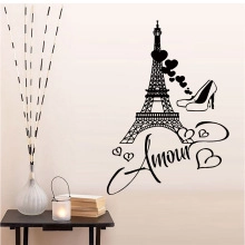 Black silhouette wall decal featuring Eiffel Tower, heels and Amour text for home decor