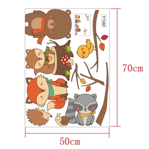 Detailed sheet showing 50x70cm forest animal wall stickers with fox and bear illustrations