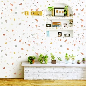 Detail of Nordic style terrazzo wall decals with colorful irregular geometric shapes for home