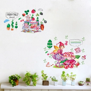 Fairytale garden wall sticker with flower fairies and berries on a white textured wall