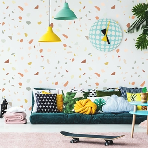 Detail of colorful terrazzo wall stickers featuring irregular stone patterns for DIY home decor