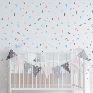 Detail of colorful terrazzo wall stickers for kids nursery in pastel stone patterns
