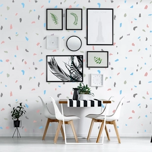 Detail of multi-color terrazzo geometric wall stickers in a modern dining room setting