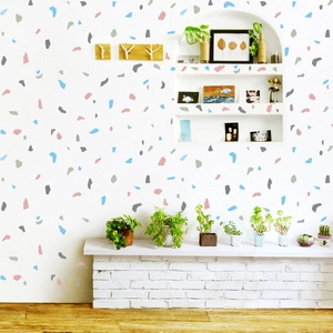 Detail of colorful terrazzo stone wall stickers in a modern minimalist living room