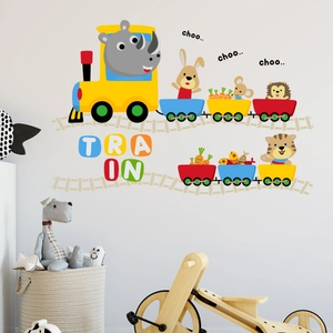 Detail of cartoon animal train wall stickers with rhino and lion in a nursery room