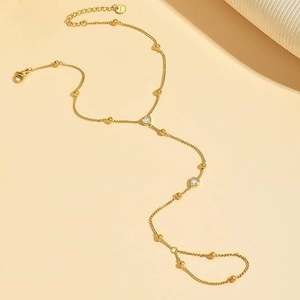 Adjustable 14K gold plated chain bracelet featuring heart-shaped zircons and round beads