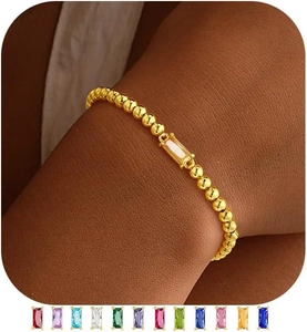 Détail du bracelet à billes dorées avec zircon champagne rectangulaire et 12 couleurs