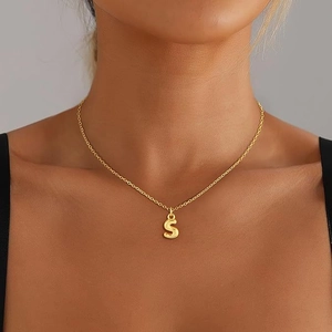 Fashionable gold bubble initial S pendant necklace for women on a sleek chain