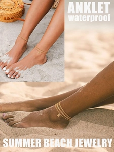 Close-up of waterproof gold double-layer Cuban link anklet with personalized letter charm