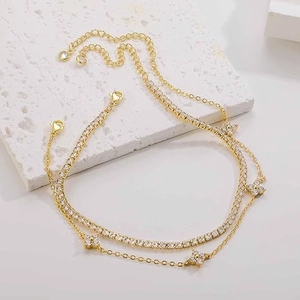 Doppellagiges vergoldetes Fußkettchen-Set mit Zirkonia-Blumen und verstellbarem Verschluss