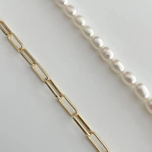 Elegant gold paperclip chain and freshwater pearl necklace with a 26-letter gold pendant