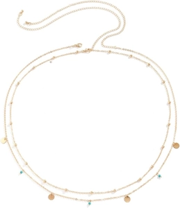 Detailed close-up of double-layer gold waist chain with turquoise beads and flat disc charms
