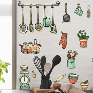 Détail des stickers muraux de cuisine avec ustensiles dessinés et pots vert menthe
