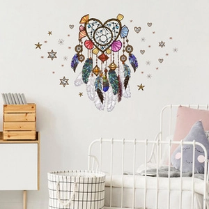 Bohemian heart-shaped dreamcatcher wall sticker with colorful feathers in a cozy bedroom