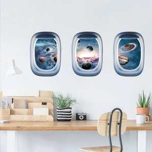 Set de 3 pegatinas de pared con forma de ventana de avión y temas de galaxias y espacio