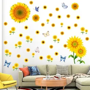 Macro detail of sunflower and butterfly wall stickers in a bright, modern living room set