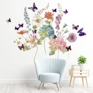 Vibrant flower and butterfly wall stickers applied on white wall in modern living room setting