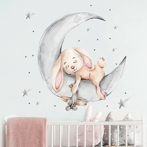 Watercolor bunny sleeping on a gray moon wall sticker for a cozy nursery decoration