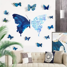 Blue 3D butterfly wall stickers with inspirational text quote over modern sofa decor