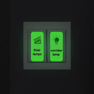 Luminous switch stickers featuring stair and corridor lamps text in dark green glow