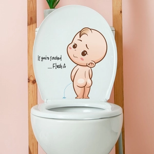 Detail of waterproof PVC toilet sticker featuring a cartoon boy and flush reminder slogan