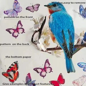 Double-sided static cling window stickers showing colorful birds, butterflies, and white flowers