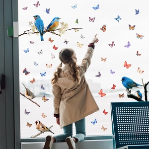 Colorful bird and butterfly static window clings with floral branch stickers on glass