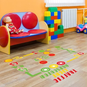 Traffic light hopscotch floor decals with colorful handprints and footprints for kids