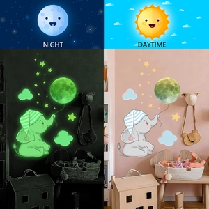 Luminous elephant moon and stars wall decals showing night glow and daytime effects