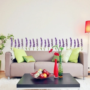 Lavender flower wall stickers set in a cozy living room with a white wall background