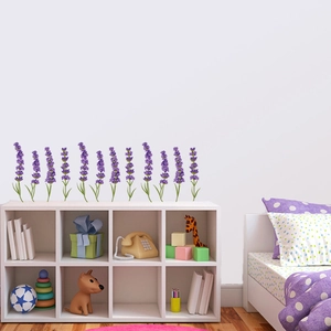 Detail view of 12 lavender wall decals applied to a white bedroom wall surface