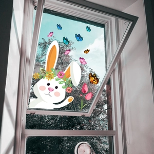 Static cling window decal with cartoon bunny, colorful butterflies and pink tulips on glass