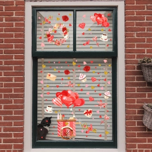 Detail von Valentinstag-Fensteraufklebern mit Herzballons und Katzenmotiven