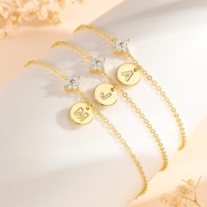 Elegant gold layered anklet set with heart zircon clover charms and custom letter pendants