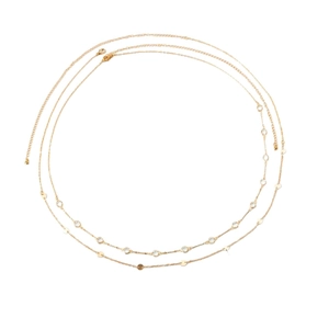 Fashionable gold body chain featuring layered metal sequins and sparkling zircon crystals