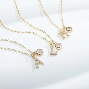 Elegant gold initial pendant necklaces with zircon stone for women, models A, L, and M