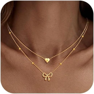 Chic 14k gold layered necklace with A-letter heart pendant and delicate bowknot detail