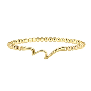 Elegant gold beaded bracelet with a polished wavy centerpiece on a white background