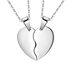 Polished stainless steel couple necklace set featuring two matching split heart pendants