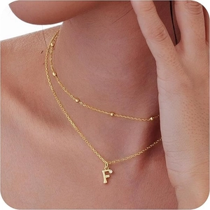Golden layered necklace with bead chain and sparkling crystal inlaid letter F pendant