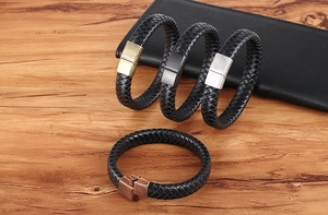 Close-up of woven leather bracelets with magnetic clasps in four vintage metal finishes