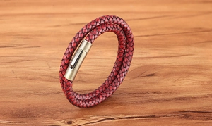 Detail of red multilayer braided leather bracelet with antique bronze magnetic clasp