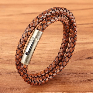 Men's multi-layer braided leather bracelet with vintage bronze magnetic clasp on wood