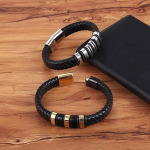 Detail of men's braided leather bracelets with stainless steel magnetic clasps
