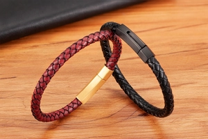 Close-up of woven leather bracelets in red and black with premium metal magnetic clasps
