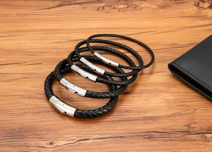 Set of four black braided leather bracelets with stainless steel magnetic clasps