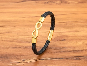 Detail of 6mm black braided leather bracelet with infinity symbol and magnetic clasp